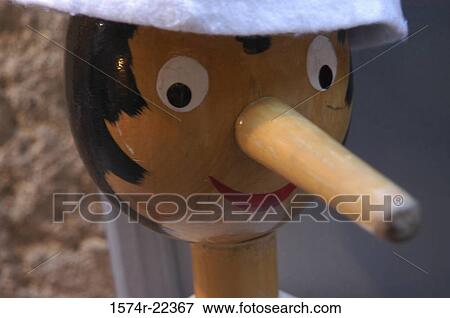 Stock Photo - Close-up of a wooden Pinocchio doll. Fotosearch