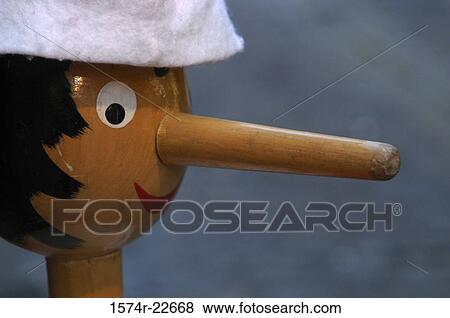 Close-up of a wooden Pinocchio doll View Large Photo Image Stock Photo - Close-up of a wooden Pinocchio doll. Fotosearch