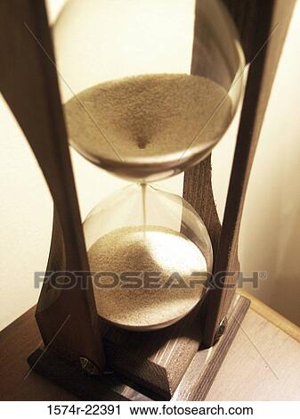 Close-up of an hourglass View Large Photo Image Stock Image - Close-up of an hourglass. Fotosearch