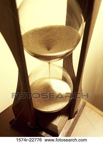 Close-up of an hourglass View Large Photo Image Stock Photograph - Close-up of an hourglass. Fotosearch