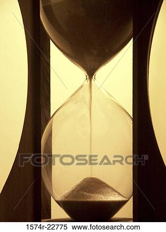 Close-up of an hourglass View Large Photo Image Stock Photography - Close-up of an hourglass. Fotosearch