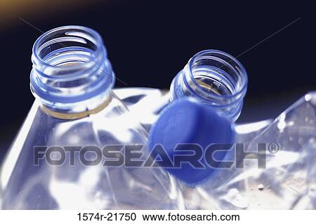 Close-up of bottles of water View Large Photo Image Stock Image - Close-up of bottles of water. Fotosearch