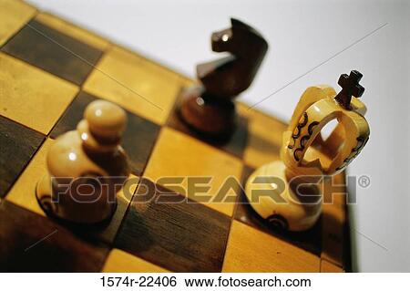 Stock Photograph - Close-up of chessmen on a chess board. Fotosearch