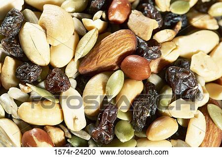 Close-up of dried fruit and assorted nuts View Large Photo Image Stock Image - Close-up of dried fruit and assorted nuts. Fotosearch