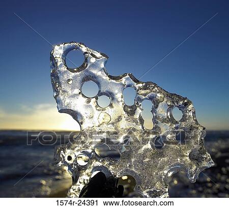 Close-up of ice melting View Large Photo Image Stock Image - Close-up of ice melting. Fotosearch
