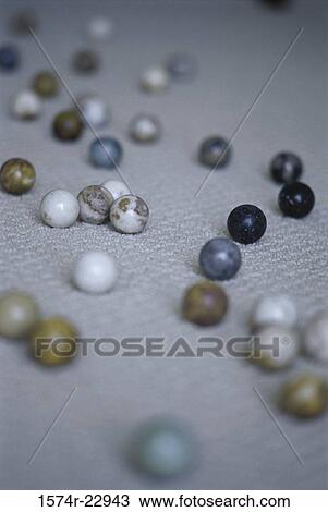 Stock Image - Close-up of marbles. Fotosearch