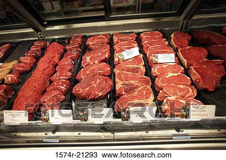 Stock Image - Close-up of raw meat in a supermarket. Fotosearch
