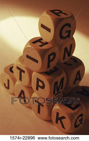 Close-up of stack of alphabetic dice View Large Photo Image Stock Photograph - Close-up of stack of alphabetic dice. Fotosearch