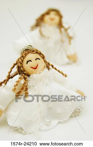 Close-up of two dolls View Large Photo Image Stock Image - Close-up of two dolls. Fotosearch