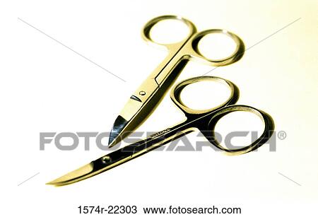 Stock Image - Close-up of two pairs of scissors. Fotosearch