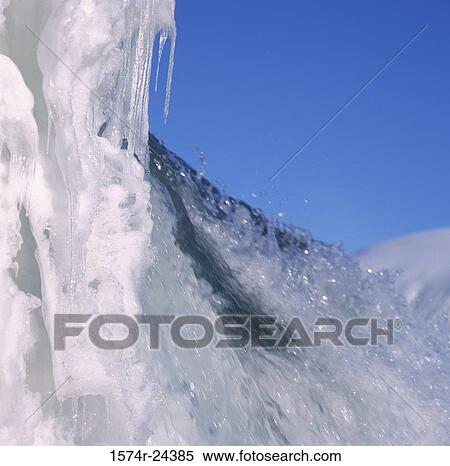 Close-up of water falling from a snow covered cliff, Gullfoss Falls, Iceland View Large Photo Image Stock Photography - Close-up of water falling from a snow covered cliff, Gullfoss Falls, Iceland. Fotosearch