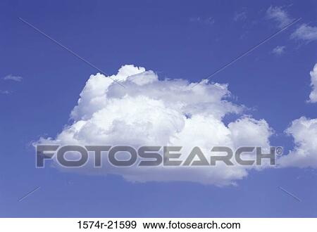 Clouds in a blue sky View Large Photo Image Stock Photo - Clouds in a blue sky. Fotosearch