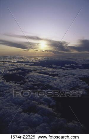 Clouds in the sky View Large Photo Image Stock Photography - Clouds in the sky. Fotosearch