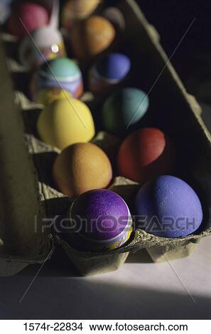 Easter eggs in an egg carton View Large Photo Image Picture - Easter eggs in an egg carton. Fotosearch