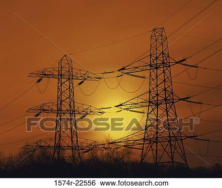 Electricity pylon during sunset, Scotland View Large Photo Image Stock Photograph - Electricity pylon during sunset, Scotland. Fotosearch