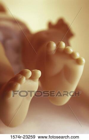 Feet of a doll View Large Photo Image Stock Photo - Feet of a doll. Fotosearch