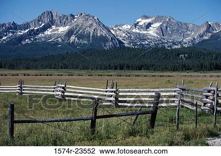 Stock Image - Fence on a landscape, Sawtooth National Recreation Area, Idaho, USA. Fotosearch