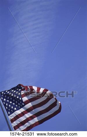 Stock Image - Flag of the United States of America fluttering. Fotosearch