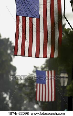 Stock Photo - Flag of the United States of America suspended. Fotosearch