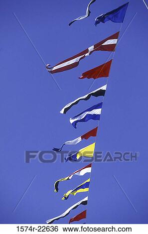 Stock Photograph - Flags of various countries fluttering. Fotosearch