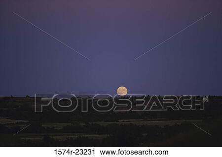 Full moon over a landscape View Large Photo Image Stock Image - Full moon over a landscape. Fotosearch
