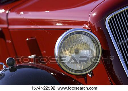 Stock Image - Headlight of a car. Fotosearch