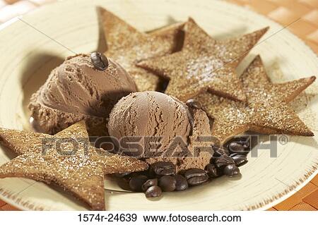 High angle view of a chocolate ice cream with bunuelos and coffee beans on a plate View Large Photo Image Stock Photo - High angle view of a chocolate ice cream with bunuelos and coffee beans on a plate. Fotosearch