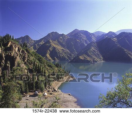 High angle view of Heaven Lake, Tianshan Mountains, Urumqi, China View Large Photo Image Stock Photo - High angle view of Heaven Lake, Tianshan Mountains, Urumqi, China. Fotosearch