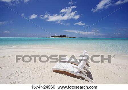High angle view of two beach chairs on the beach View Large Photo Image Stock Image - High angle view of two beach chairs on the beach. Fotosearch