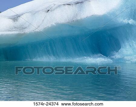 Iceberg floating on water, Jokulsarlon, Iceland View Large Photo Image Picture - Iceberg floating on water, Jokulsarlon, Iceland. Fotosearch