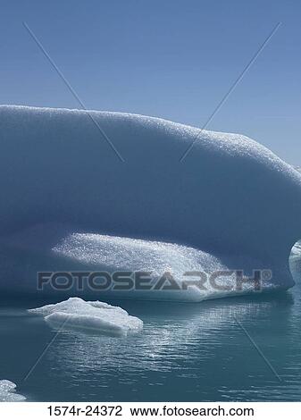 Iceberg floating on water, Jokulsarlon, Iceland View Large Photo Image Stock Image - Iceberg floating on water, Jokulsarlon, Iceland. Fotosearch