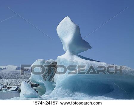 Iceberg floating on water, Jokulsarlon, Iceland View Large Photo Image Stock Photo - Iceberg floating on water, Jokulsarlon, Iceland. Fotosearch