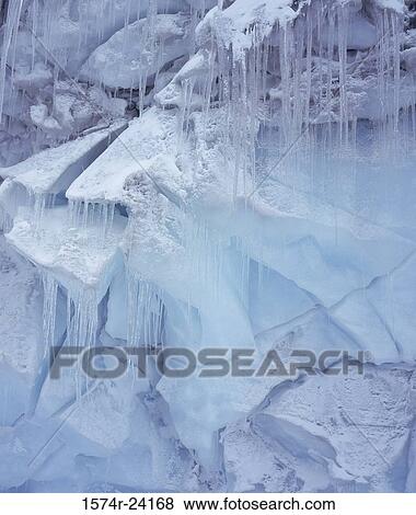 Stock Photo - Icicles on an iceberg, Iceland. Fotosearch