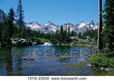 Lake surrounded by mountains, Alice Lake, Sawtooth National Recreation Area, Idaho, USA View Large Photo Image Stock Image - Lake surrounded by mountains, Alice Lake, Sawtooth National Recreation Area, Idaho, USA. Fotosearch