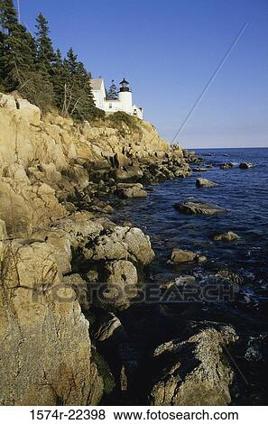 Lighthouse on a cliff, Bass Head Lighthouse, Mount Desert Island, Maine, USA View Large Photo Image Stock Photo - Lighthouse on a cliff, Bass Head Lighthouse, Mount Desert Island, Maine, USA. Fotosearch