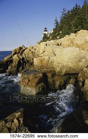 Lighthouse on a cliff, Bass Head Lighthouse, Mount Desert Island, Maine, USA View Large Photo Image Stock Photography - Lighthouse on a cliff, Bass Head Lighthouse, Mount Desert Island, Maine, USA. Fotosearch