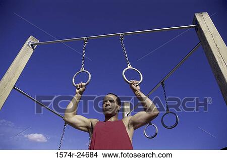 Low angle view exercising View Large Photo Image Picture - Low angle view exercising. Fotosearch