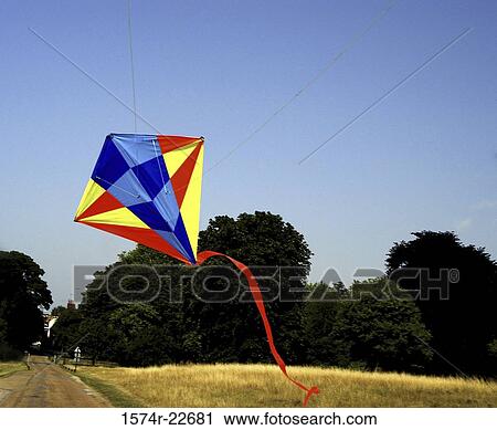 Low angle view of a kite in the sky View Large Photo Image Stock Image - Low angle view of a kite in the sky. Fotosearch