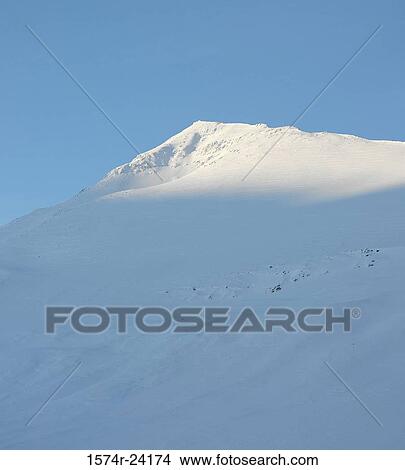 Low angle view of a snow covered mountain, Lagheidi, Iceland View Large Photo Image Picture - Low angle view of a snow covered mountain, Lagheidi, Iceland. Fotosearch