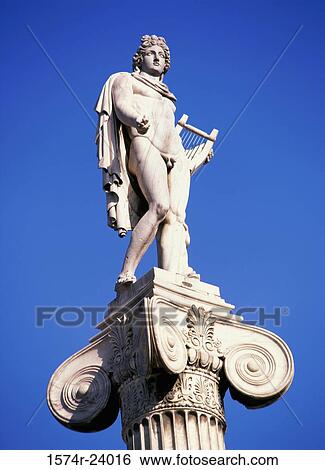 Low angle view of a statue, Academy of Arts and Sciences, Athens, Greece View Large Photo Image Stock Photograph - Low angle view of a statue, Academy of Arts and Sciences, Athens, Greece. Fotosearch