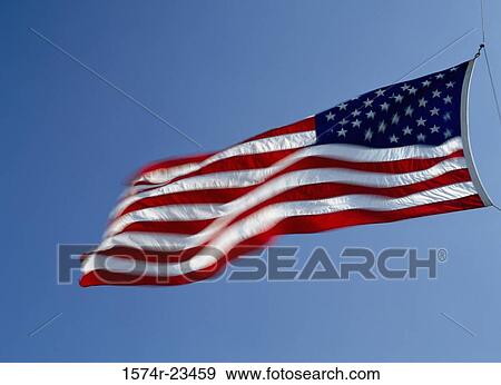 Low angle view of an American flag View Large Photo Image Stock Photo - Low angle view of an American flag. Fotosearch