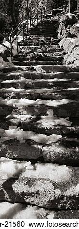 Stock Image - Low angle view of steps with snow. Fotosearch