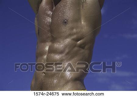 Stock Photography - Mid section view of a young man. Fotosearch