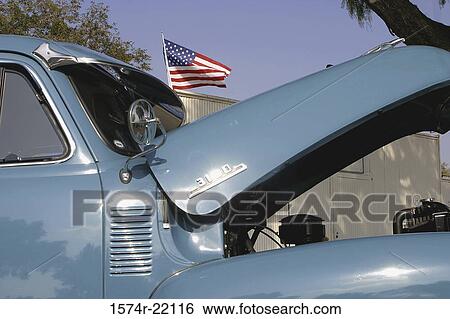 Stock Photograph - Open bonnet of a vintage car. Fotosearch