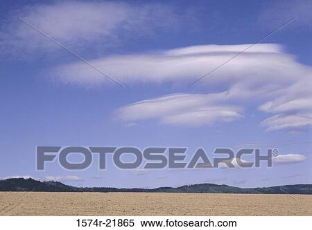 Panoramic view of a barren landscape View Large Photo Image Stock Photography - Panoramic view of a barren landscape. Fotosearch