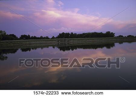 Panoramic view of a lake during sunset, Kansas, USA View Large Photo Image Stock Image - Panoramic view of a lake during sunset, Kansas, USA. Fotosearch