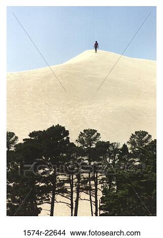 Person on a hill View Large Photo Image Picture - Person on a hill. Fotosearch