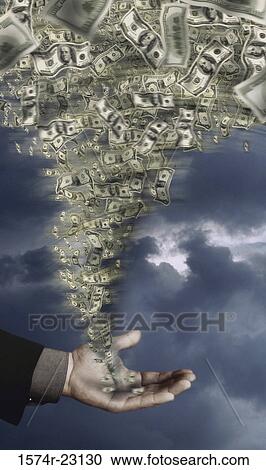 Person's hand holding a tornado of paper money View Large Photo Image Stock Image - Person's hand holding a tornado of paper money. Fotosearch