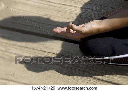 Person's hand in the lotus position View Large Photo Image Stock Photo - Person's hand in the lotus position. Fotosearch