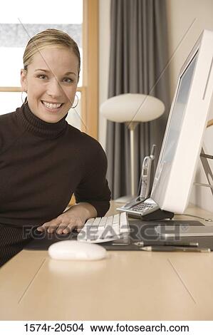 Portrait of a young woman smiling View Large Photo Image Picture - Portrait of a young woman smiling. Fotosearch